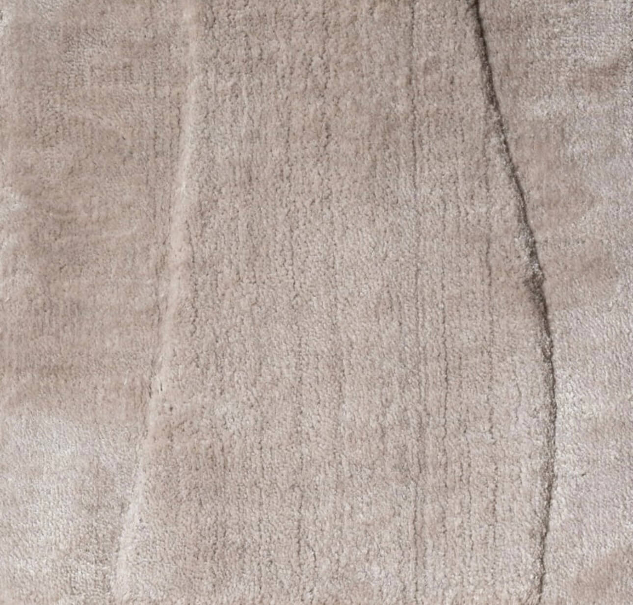 Round Neutral Toned Rug