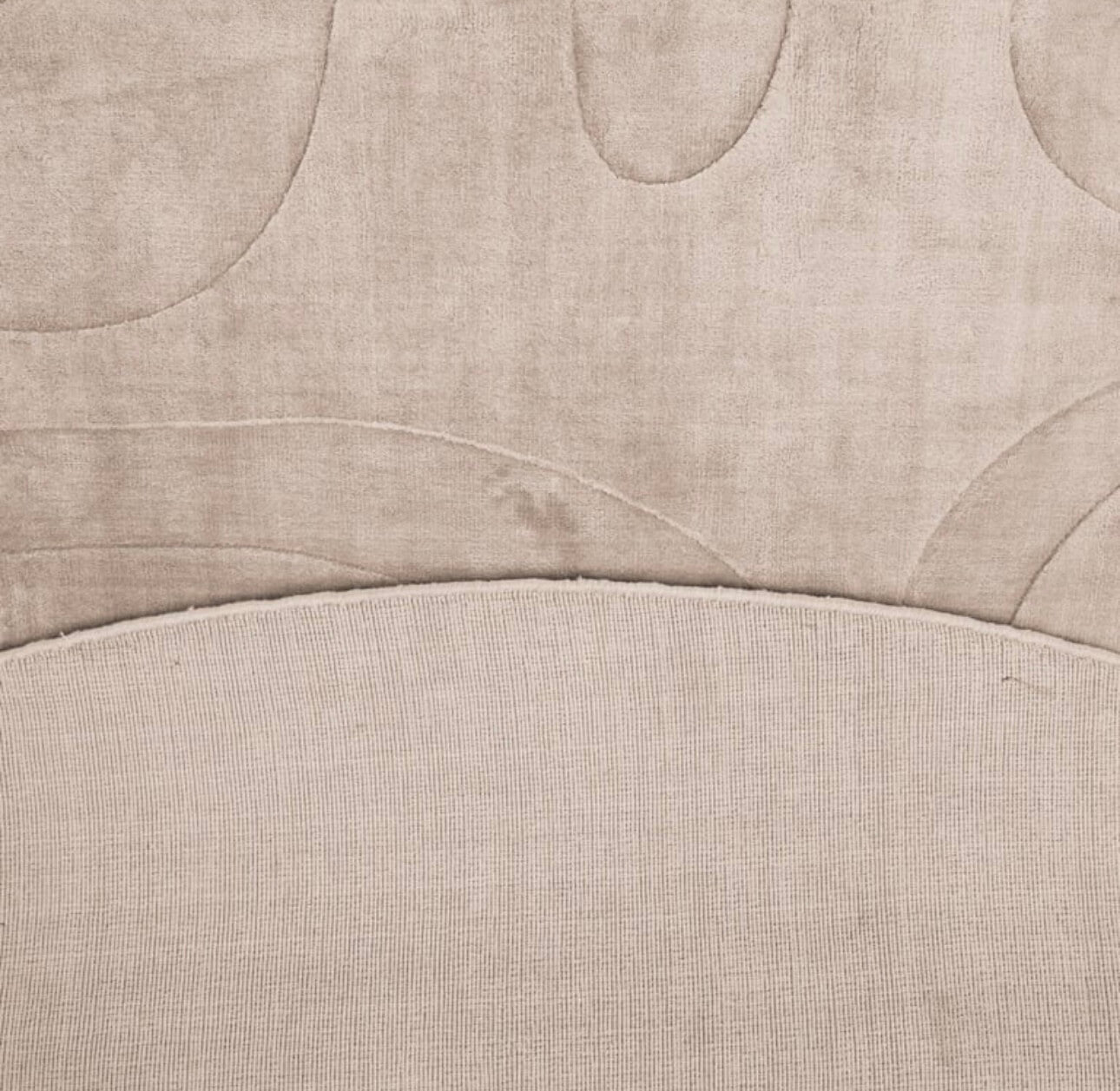 Round Neutral Toned Rug